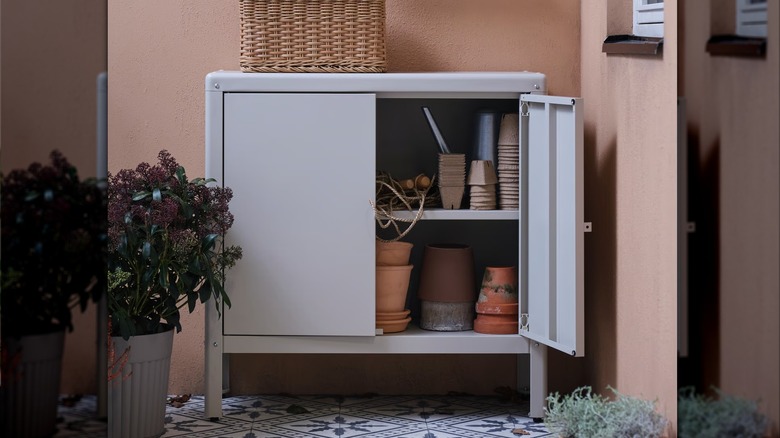 The KOLBJÖRN indoor/outdoor cabinet﻿ on a patio