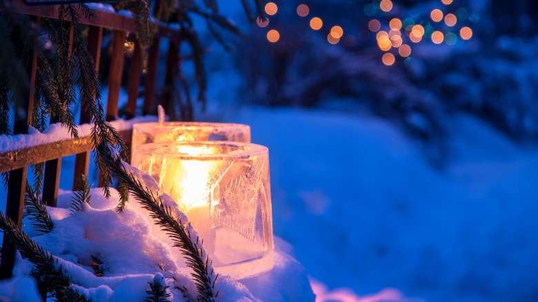 Ice lanterns near porch railing