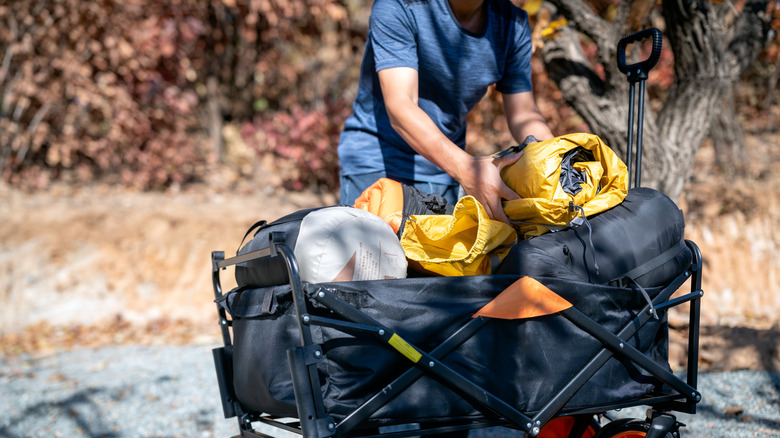 Camper loading up his wagon for trip