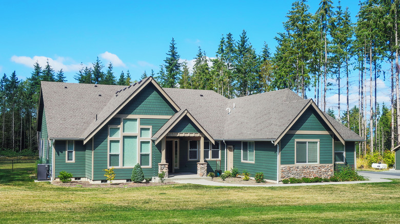 Front yard of a teal house
