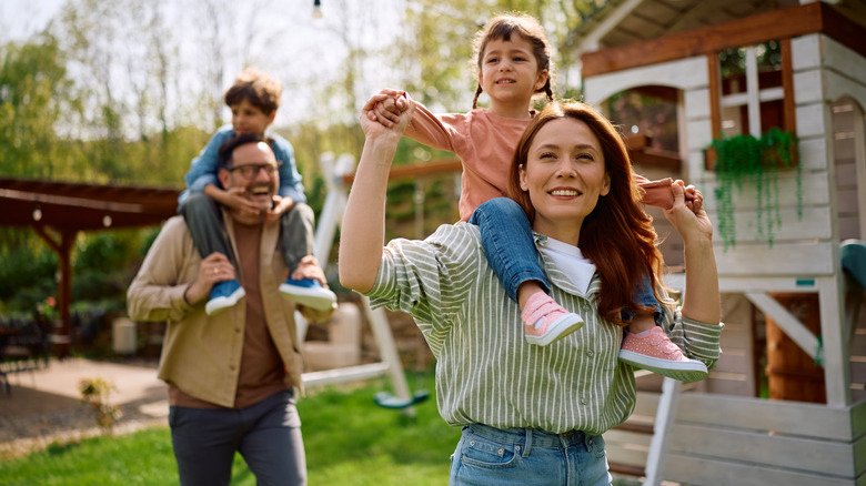 A family having fun in their yard