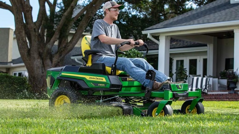 Person riding the John Deere Z370R Electric ZTrak mower