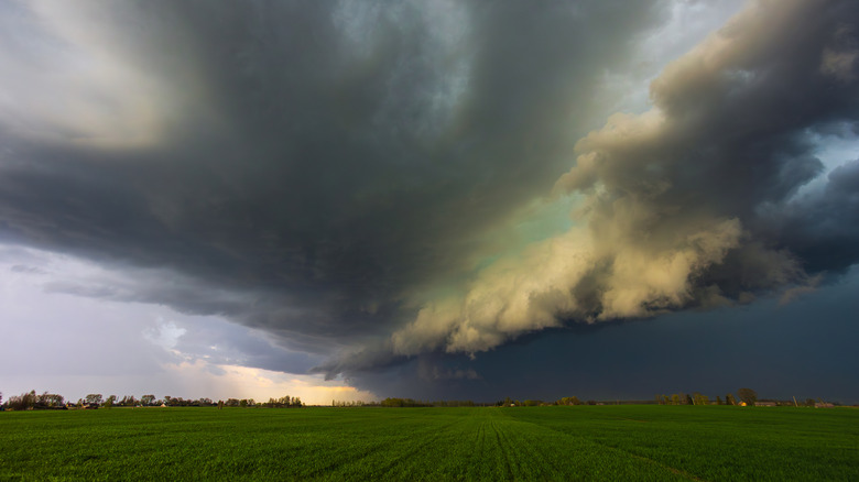 Storm moving across farm land