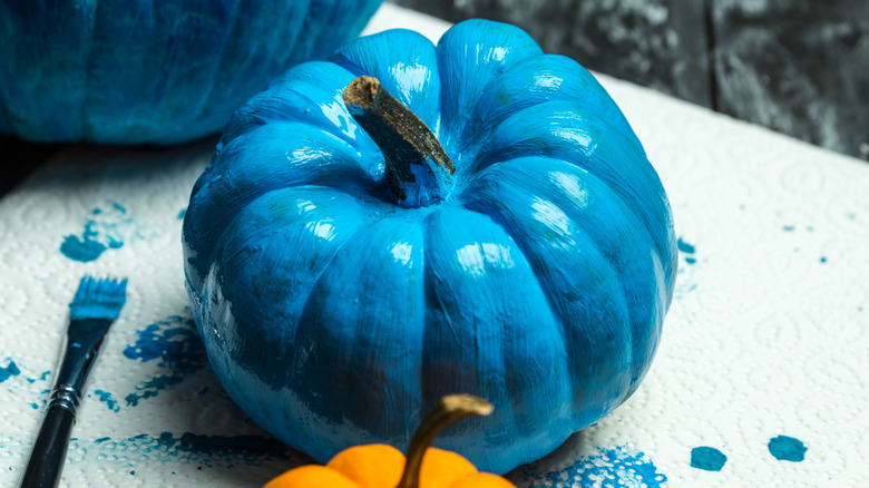 Pumpkin painted blue