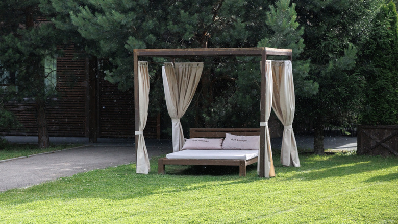 cozy outdoor daybed for backyard