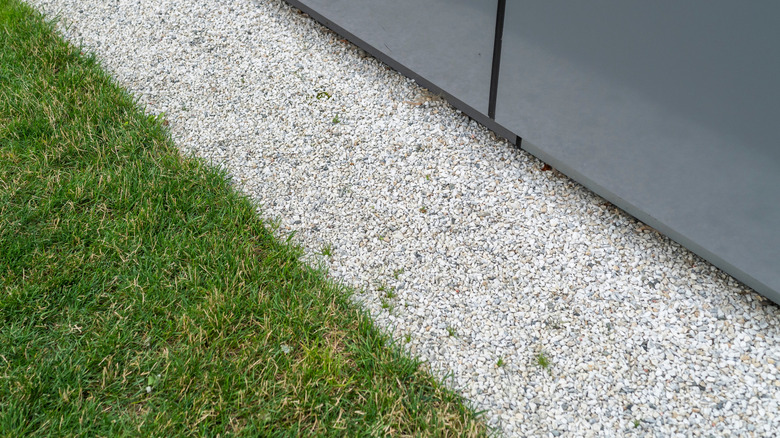 Gravel no-grow zone near fence