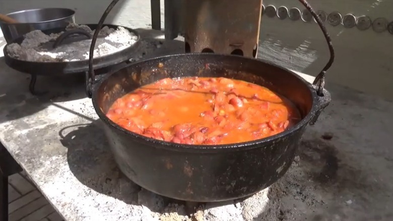 A Dutch oven full of beanie weenies
