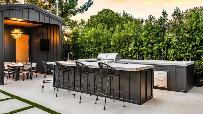 Microcement countertops in modern outdoor kitchen