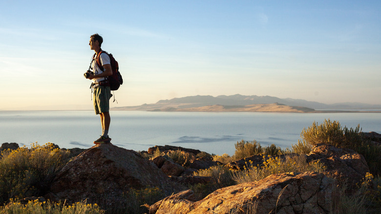 Hiker taking in scenery of Antelope Island State Park