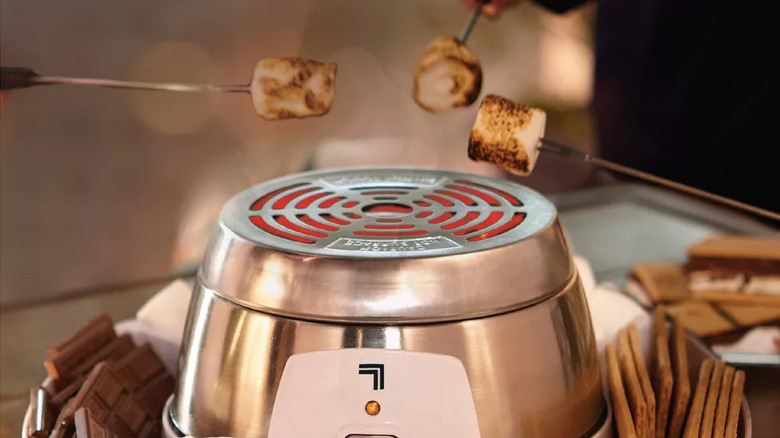 An electric marshmallow and s'mores toaster