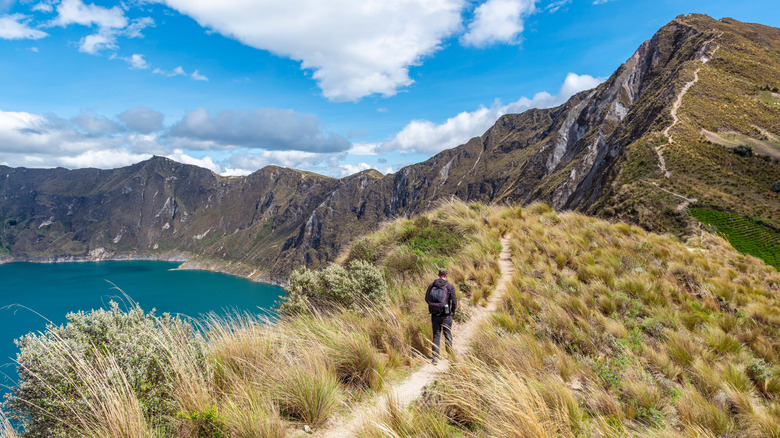 Hiking near Quilotoa volcanic lake in Ecuador
