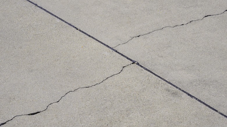 Closeup of a broken concrete paver