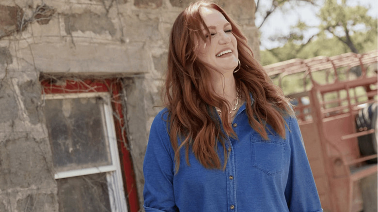 Ree Drummond outside a stone building