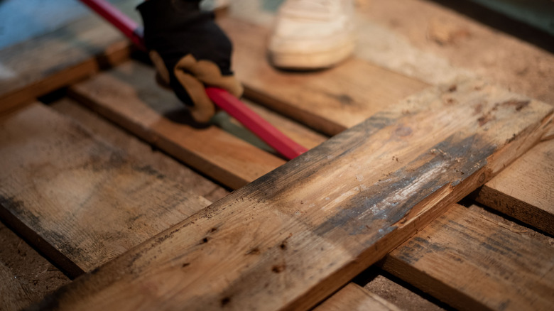 crow bar ripping up pallets