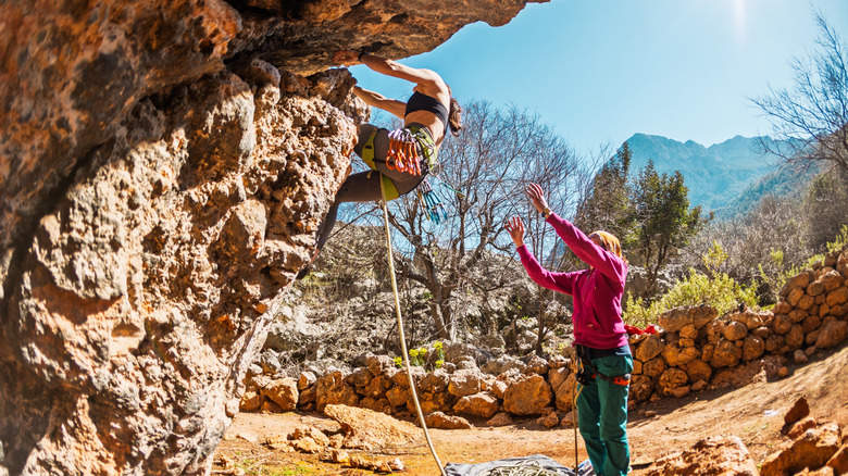 Woman practicing rock climbing