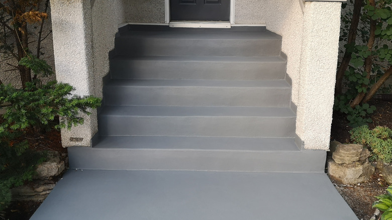 Concrete stairs sealed with a dark gray acryllic sealant