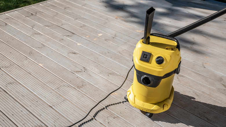 Shop vacuum on outdoor deck