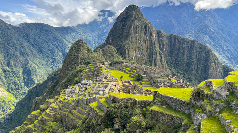 An aerial view of the ancient Machu Picchu ruins and the peak of Huayna Picchu