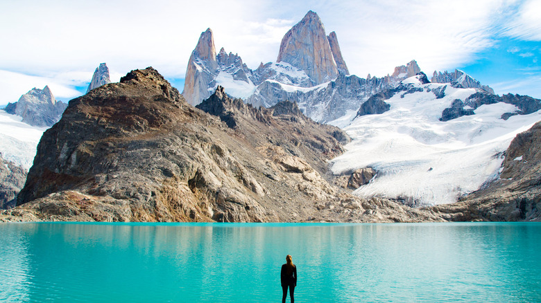 A Patagonian lake with snow-capped mountains in the distance
