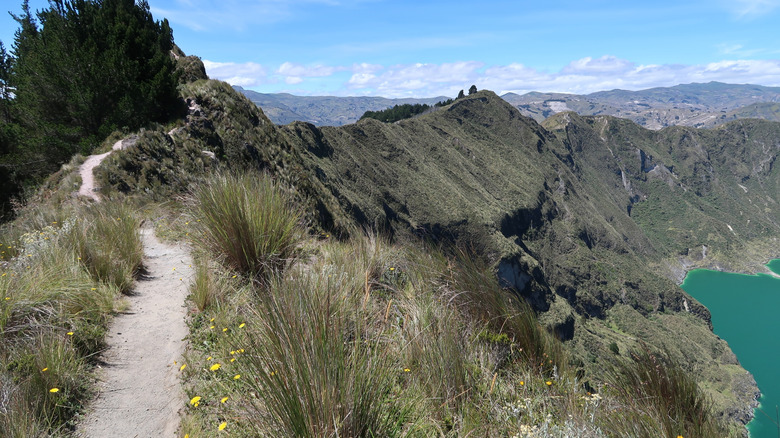 A ridge-top view of the lake-studded, volcanic landscape along the Quilotoa Loop
