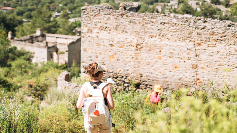 Person looking at ruins in Greece