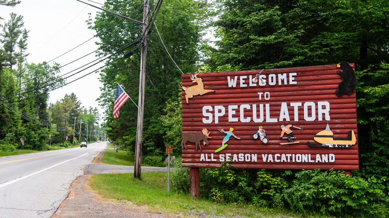 Large sign that says "Welcome to Speculator, all season vacationland""