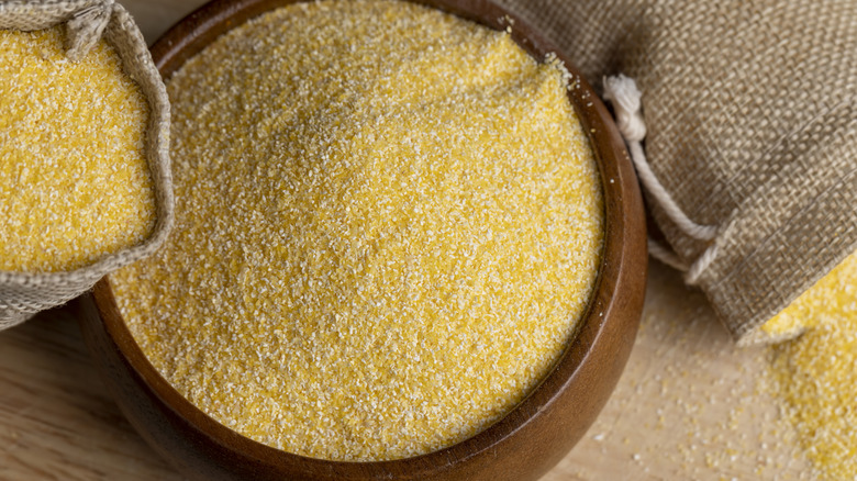 A bowl of cornmeal on a table