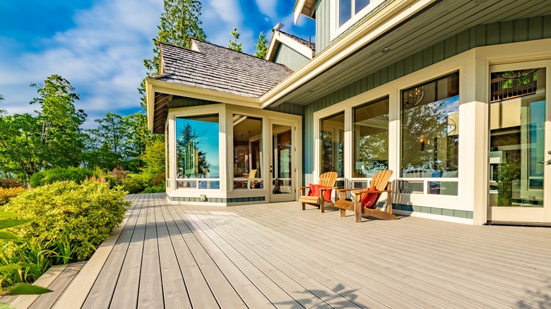 Home with a grey wooden deck