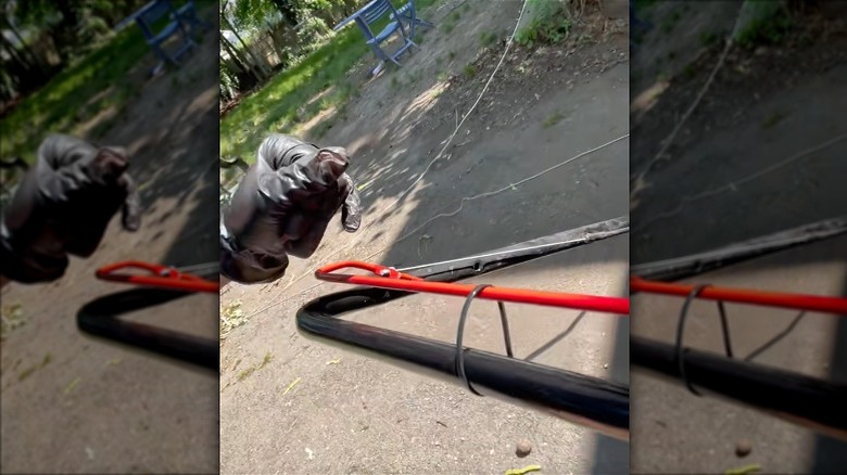 using a zip tie on a lawn mower handle