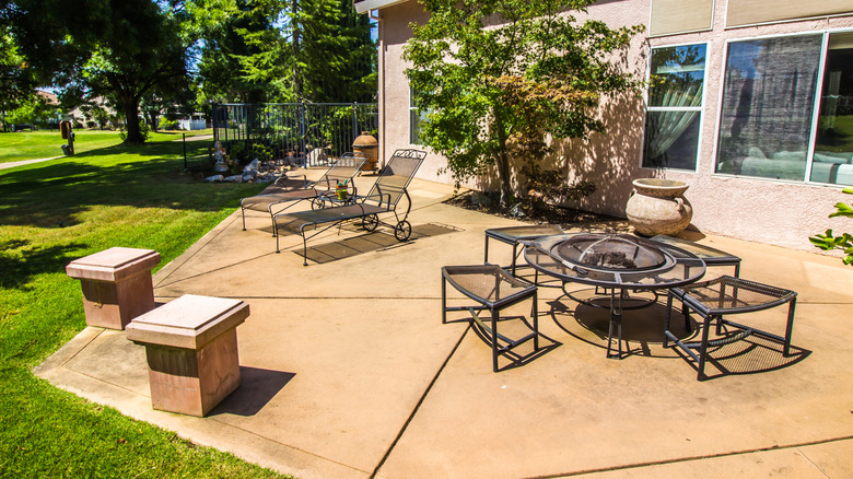 Patio furniture on a boring concrete patio