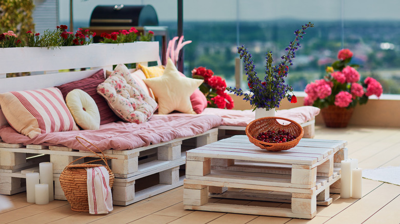 A beautiful patio sofa made from reclaimed wood pallets