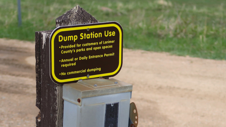 A dump station usage sign with rules