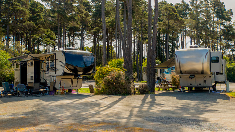 Two RVs camped closely together