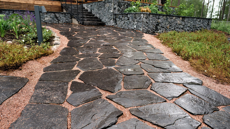 natural slate lining walkway to home