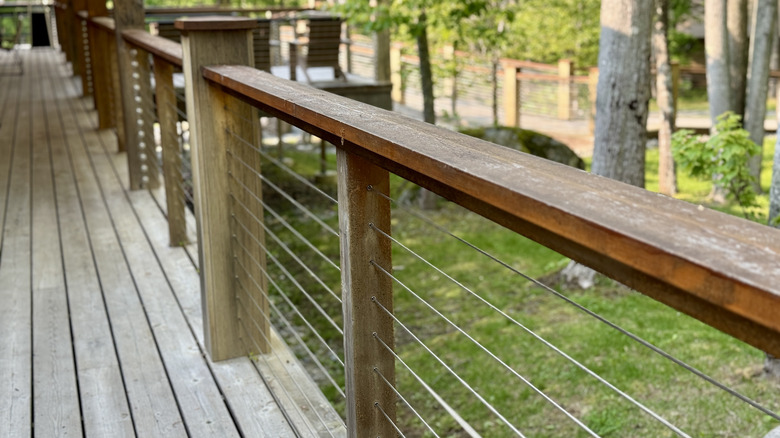 Cable deck railing in the woods