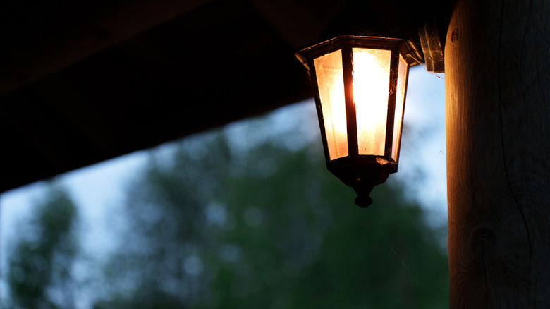 Lantern-style porch light on at night