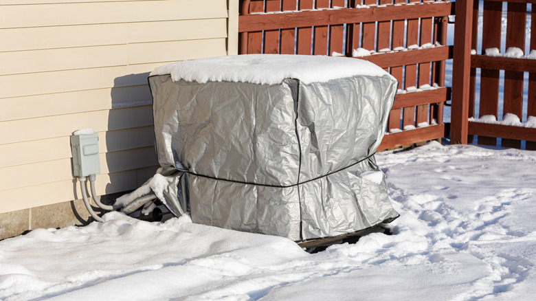 Waterproof cover over an AC Unit