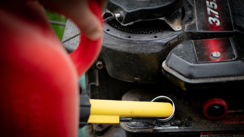 filling lawn mower with gas
